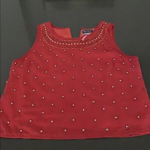 Sleeveless red sequin blouse